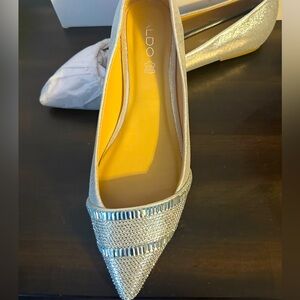 Silver aldo pointed flats with crystal toe